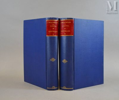 Les deux livres sont bleus et rouges, avec des bordures dorées.