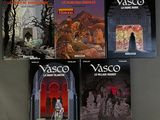 five books of vasco on a table in front of a wall