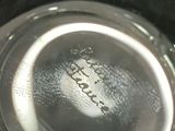 a close up of a glass with water in it