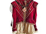 an image of a red and gold jacket hanging on a hanger
