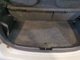 a trunk of a car with the back seats folded down