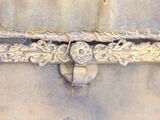 a close up of a piece of fabric with a metal handle