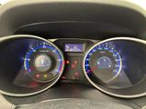 the dashboard of a car with a speedometer, gauges, and other electronic equipment