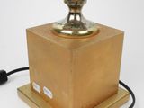 an image of a lamp that is on top of a wooden base