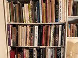a book shelf with a lot of books on it