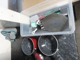 an image of a kitchen with pots and pans on the counter