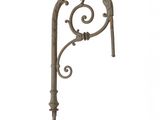 a close up of a metal pole with a decorative design on it