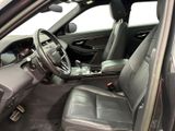 the interior of a car with leather seats and a steering wheel