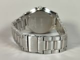 a close up of a watch on a white surface