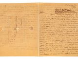 un gros plan d'un morceau de papier sur lequel on a écrit