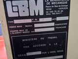 a sign on the door of a building that says bbm