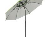un parapluie blanc muni d'un manche vert fixé à une tige