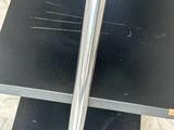 a sword that is sitting on top of a table