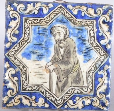 un carreau bleu et blanc représentant un homme coiffé d'un turban