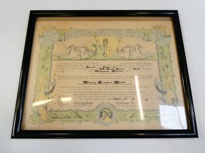 une photo encadrée d'un certificat accrochée au mur