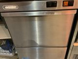 a stainless steel dishwasher and a microwave in a kitchen