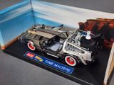 a model of a back to the future time machine in a display case