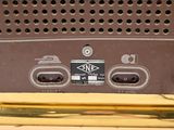 a close up of a radio that is sitting on a table