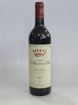 a bottle of wine that is sitting on a table
