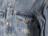 an image of a denim jacket with the words from the future written on it