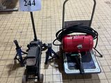 a red fire hydrant sitting on the floor next to a sign