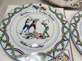two plates that have different designs on them on the table