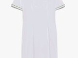 a white t - shirt with a green stripe on the chest