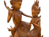 wooden statue of a woman and a child on a white background