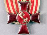 a red and gold cross with a red and white stripe on it