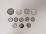a lot of coins that are sitting on a table