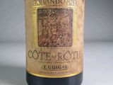 a bottle of wine that is sitting on a table