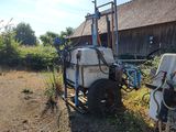 a tractor that is parked on the side of the road
