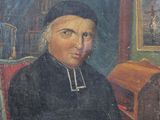 portrait of a man with a book in a chair in front of a painting