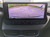 an image of a car dashboard with a rear view camera