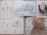 many drawings on the wall next to each other