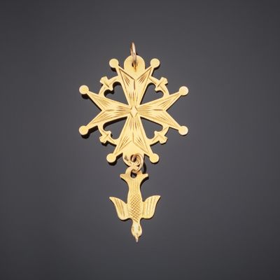 a gold cross on a black background