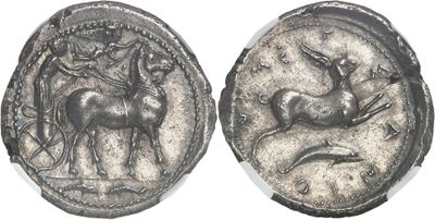 a close up of a coin with a horse and a man on it
