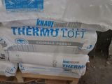 a stack of white bags sitting on top of a pallet