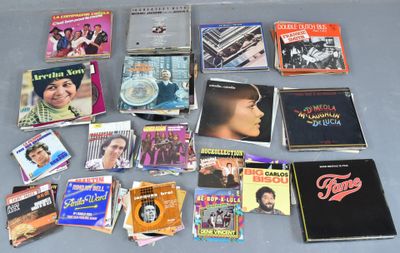 beaucoup de cd de musique et de cd sur la table
