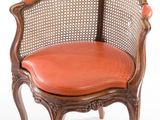 an image of a chair with a leather seat on a white background