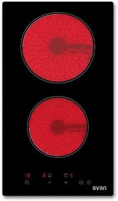 une plaque de cuisson noire et rouge équipée de deux feux