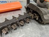 a close up of a metal tool on a table