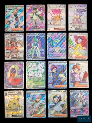 Les cartes Pokémon sont alignées sur une surface noire.
