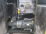 a machine that is sitting inside of a metal container