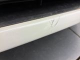 a close up of a dirty oven door handle