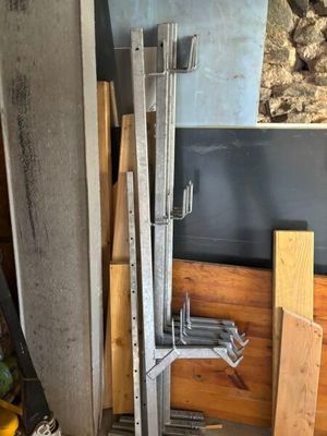 several pieces of wood are stacked on top of each other in a room