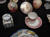 a table with a lot of china on it