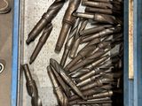 a box full of tools that are sitting on the floor