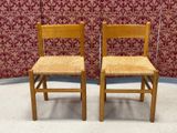 two chairs that are next to each other on the floor