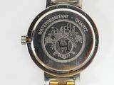 an image of a close up of a watch on a white surface